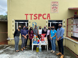 Members of the Criminal Justice Unit after donating and tour of the Trinidad and Tobago Society for the Prevention of Cruelty to Animals